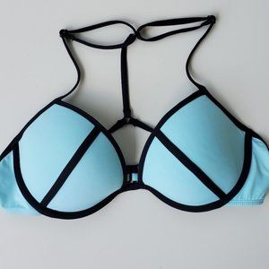Bold outlined teal and black push-up bikini top